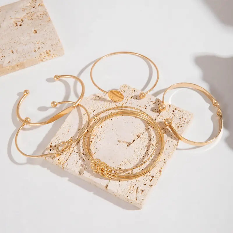 Conjunto de pulseras «Knotted Elegance» | Oro
