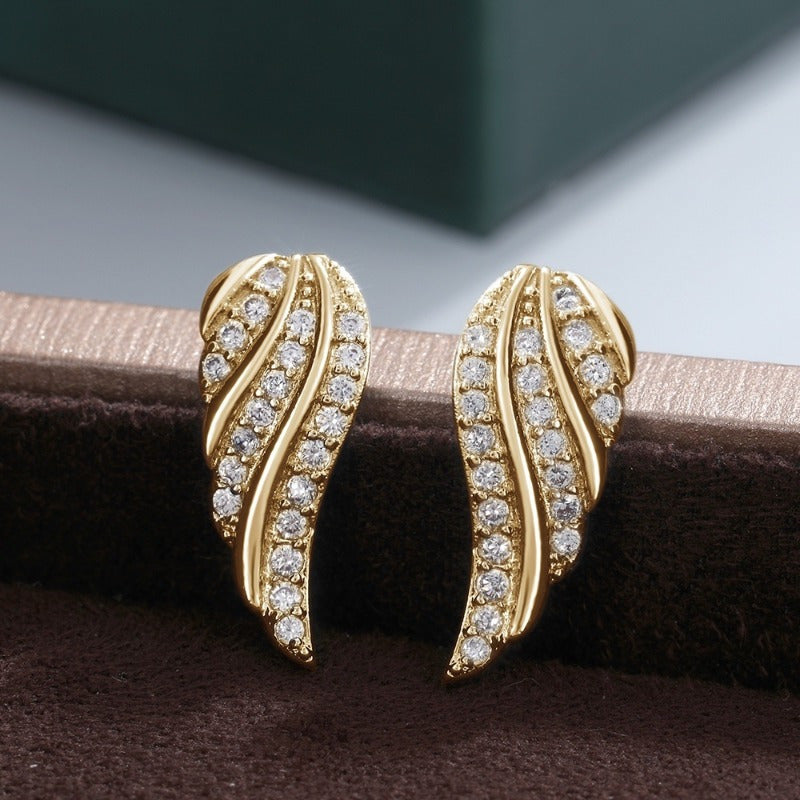 Pendientes modernos con diseño de hojas en pavé | Oro