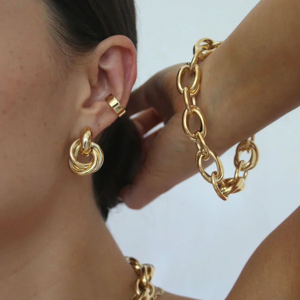 Pendientes llamativos entrelazados | Oro