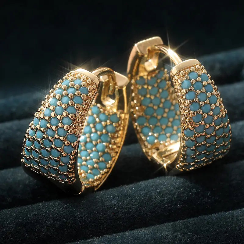 Pendientes de aro con cuentas turquesa de tono dorado | Oro